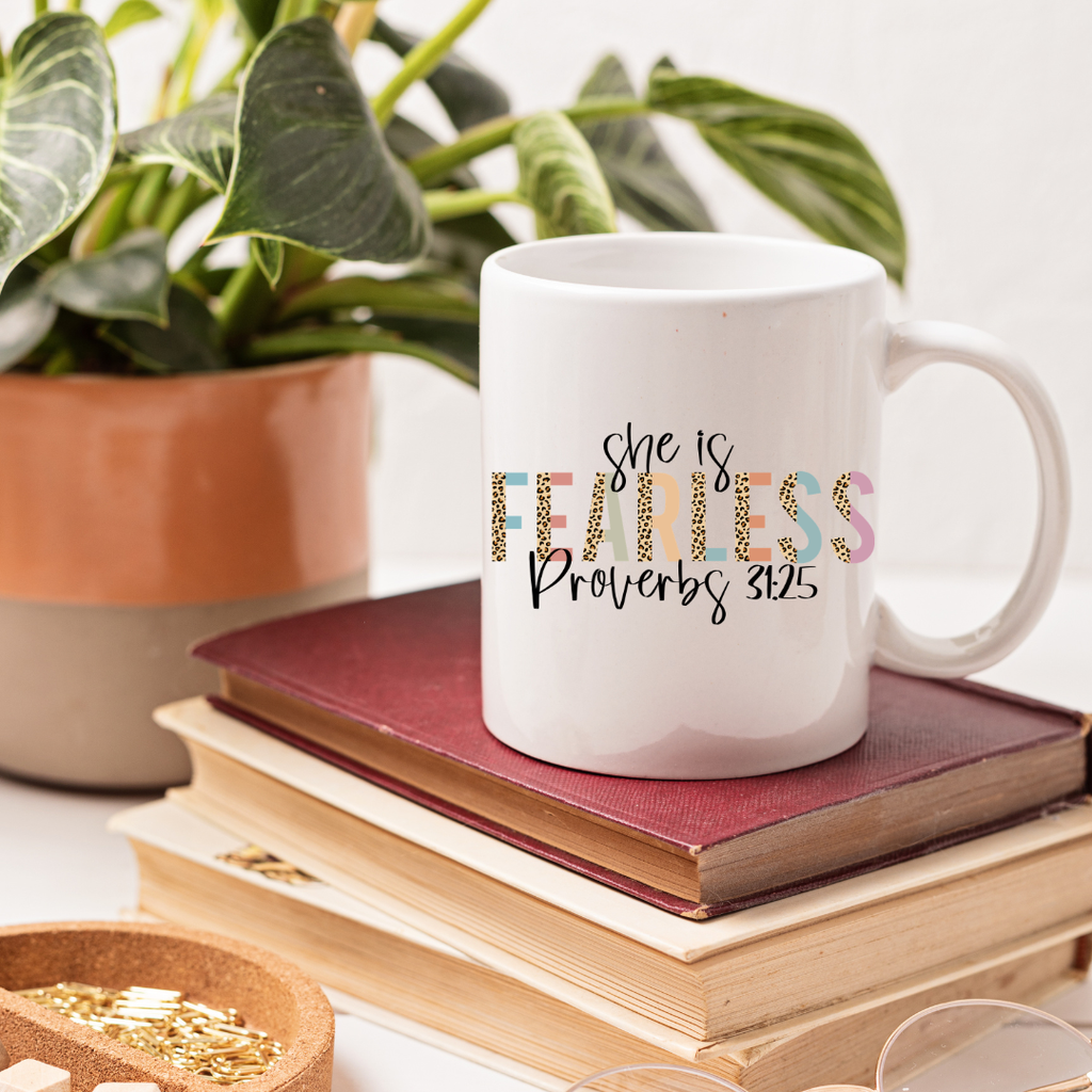 She Is Fearless — Proverbs 31:25 Scripture Mug