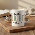 Be the Light Mug - Lifestyle Background